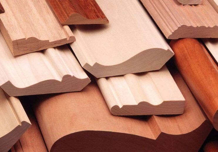 Assorted finished wood moulding profiles